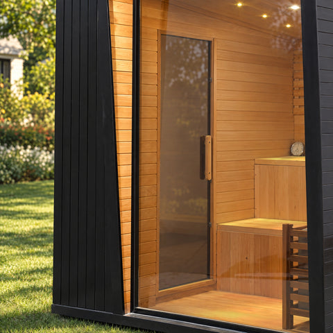 Detail of the glazed side entrance and vertical timber pull seen through the front glass.