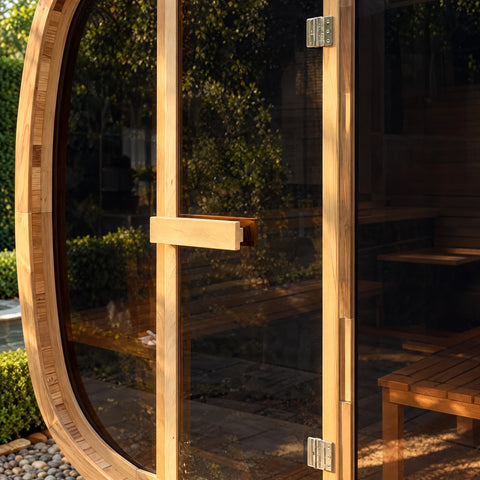 Detail of the horizontal timber pull against the glass door and cedar frame.