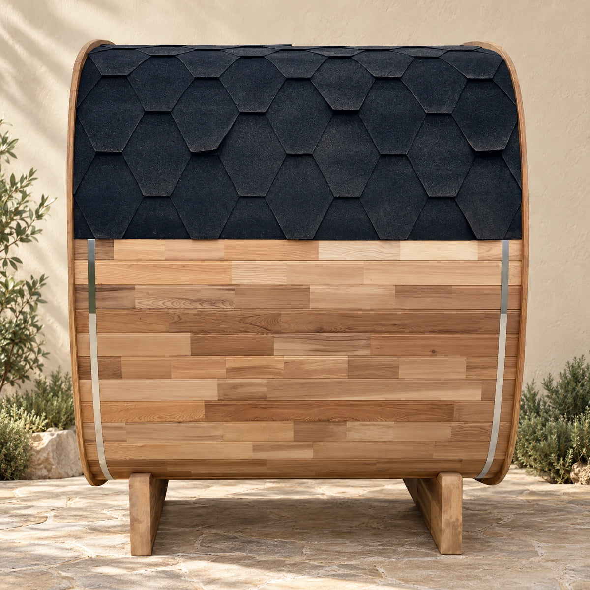 Side view of the red cedar sauna showing the dark roof covering, timber boards, metal bands and timber cradles.